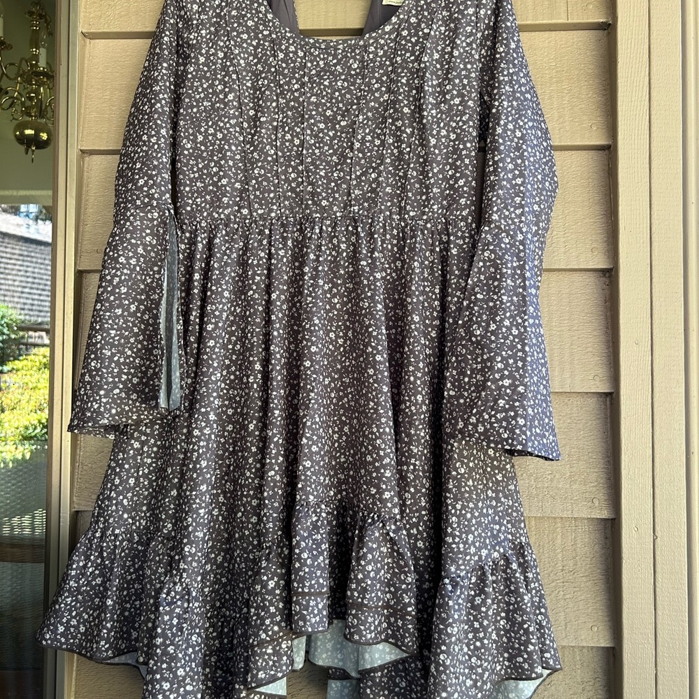 Mia Joy dress asymmetrical hem slip sleeves hidden side zipper V- dip backside.